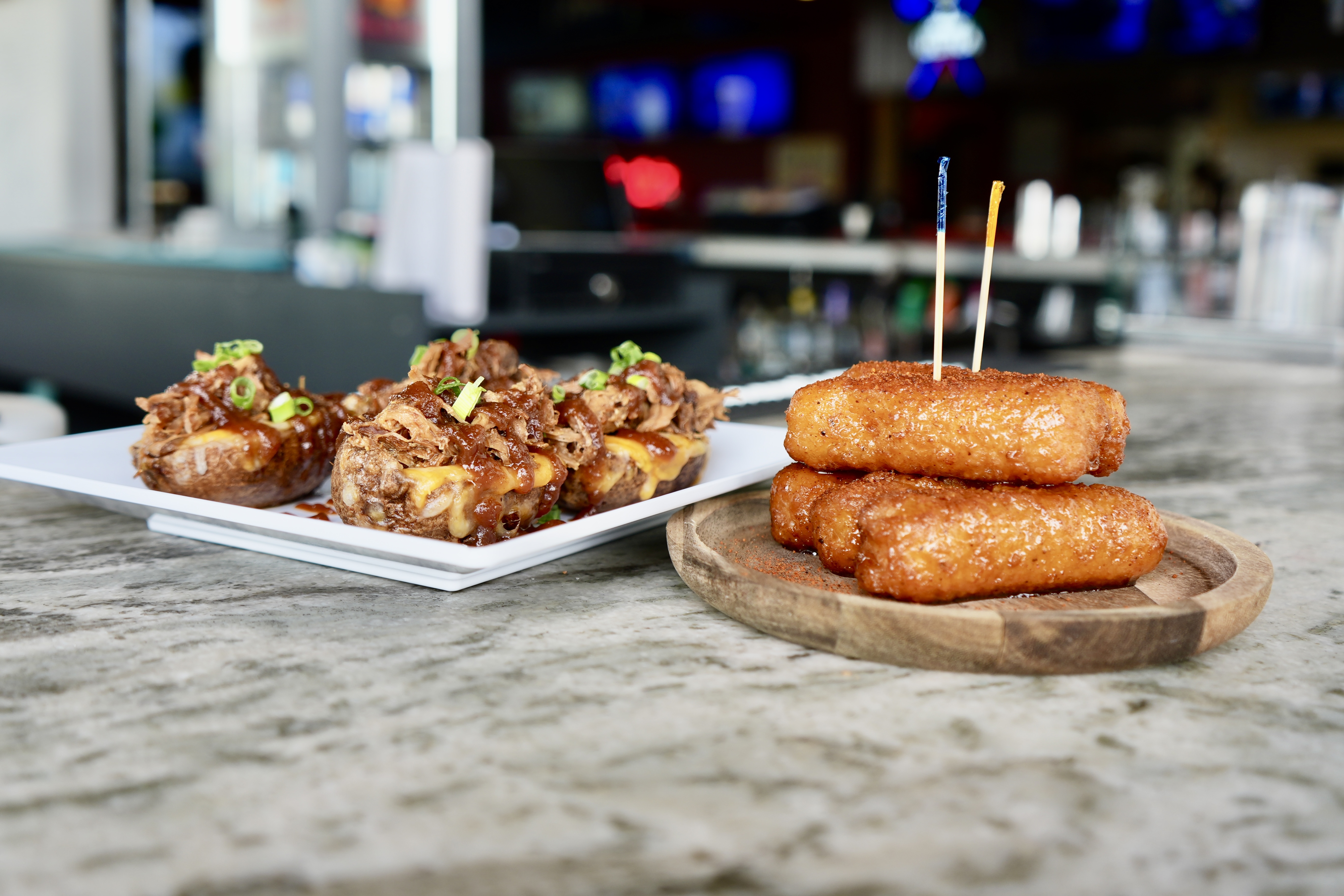 Loaded potato skins and fried cheese sticks